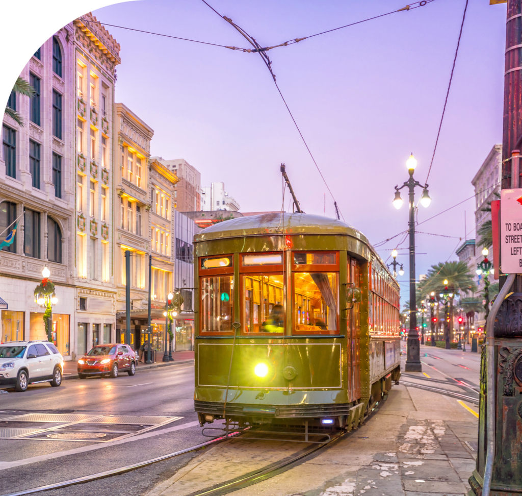 trolley drives through a city